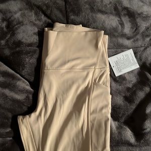 Lululemon HR Align pant 25” with pockets. Size 12. NWT.  Creamy beige color.